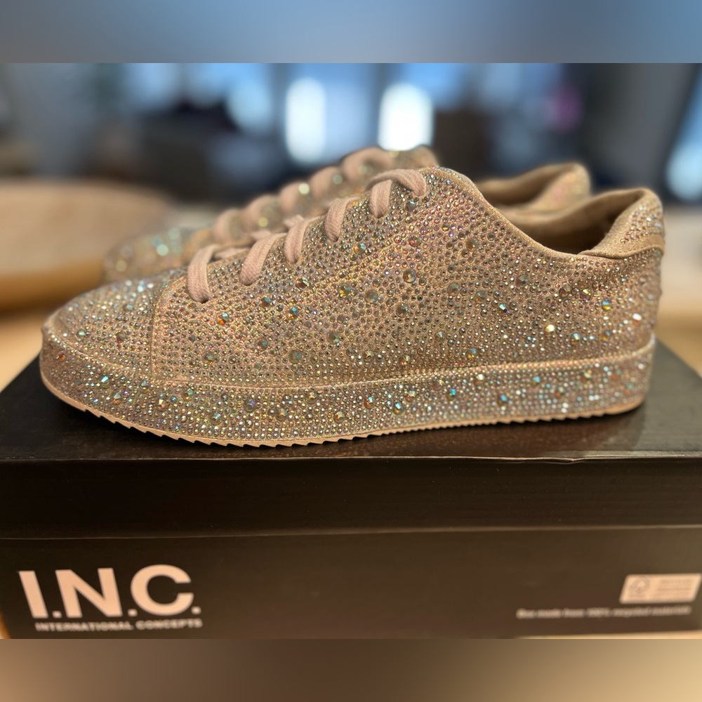 INC sneakers.